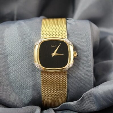 Piaget ladies 18k yellow gold diamond watch vintage front view