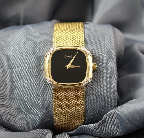 Piaget ladies 18k yellow gold diamond watch vintage front view