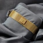 Piaget ladies 18k yellow gold bracelet clasp with diamond set watch