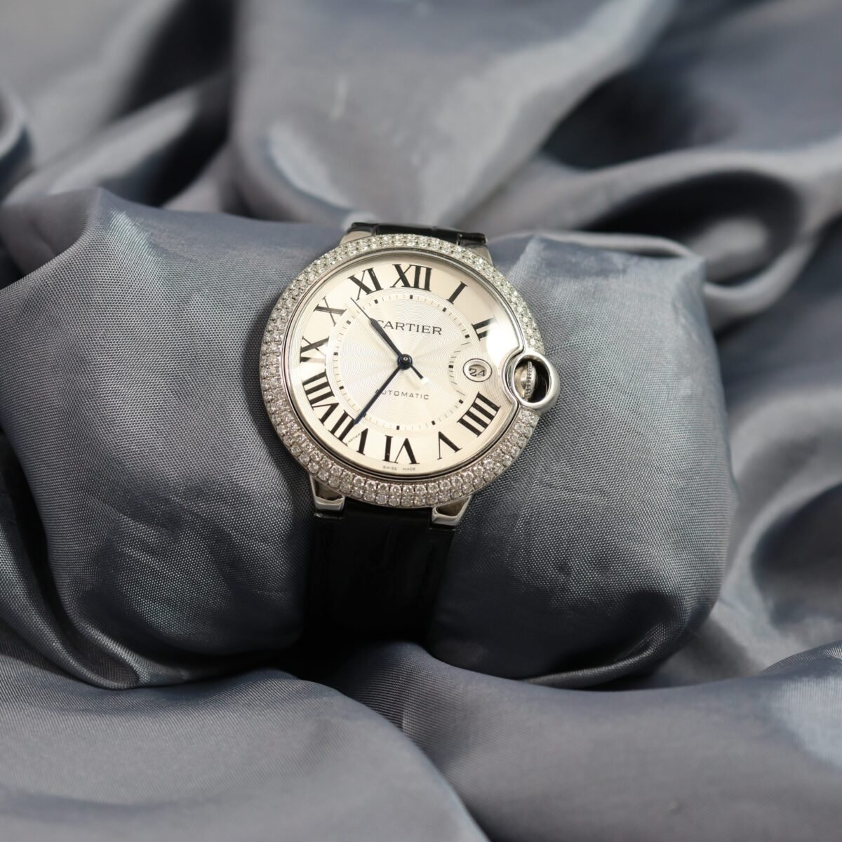 Cartier Ballon Bleu 42mm automatic watch with diamond bezel stainless steel front view