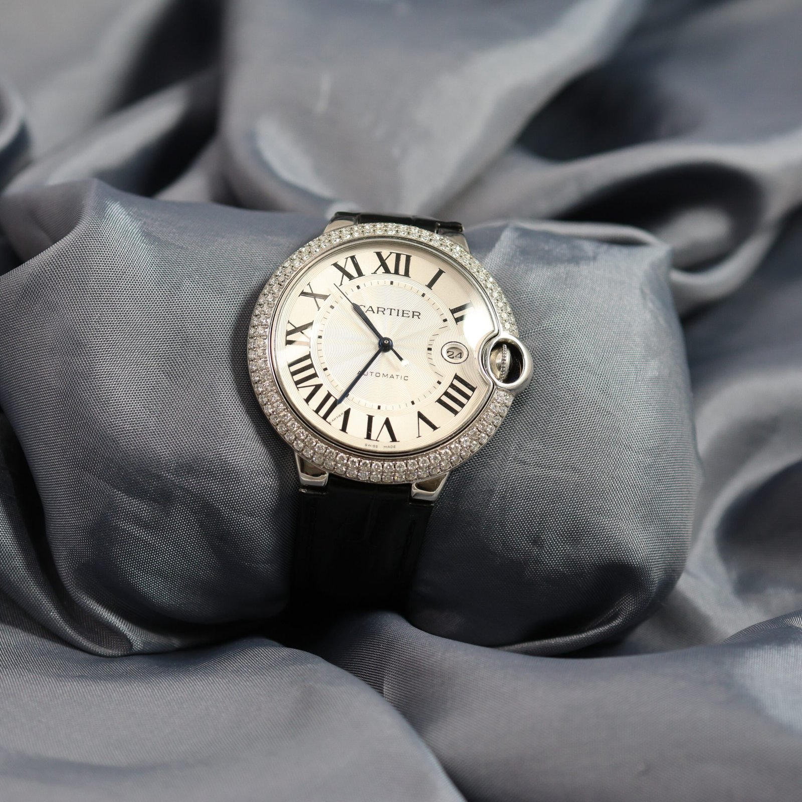 Cartier Ballon Bleu 42mm automatic watch with diamond bezel stainless steel front view