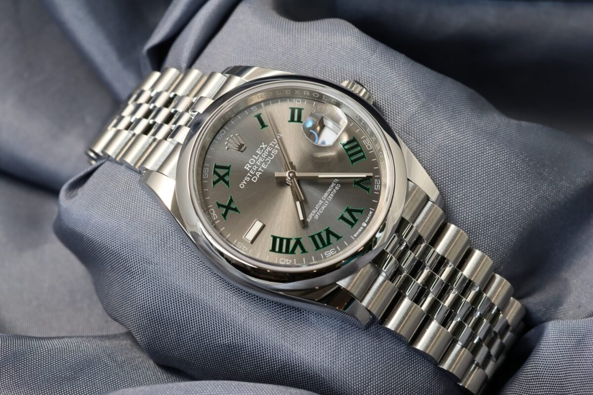 Close-up of the Rolex Datejust 36mm Wimbledon Dial 126200 showing green Roman numerals and stainless steel case