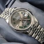 Close-up of the Rolex Datejust 36mm Wimbledon Dial 126200 showing green Roman numerals and stainless steel case