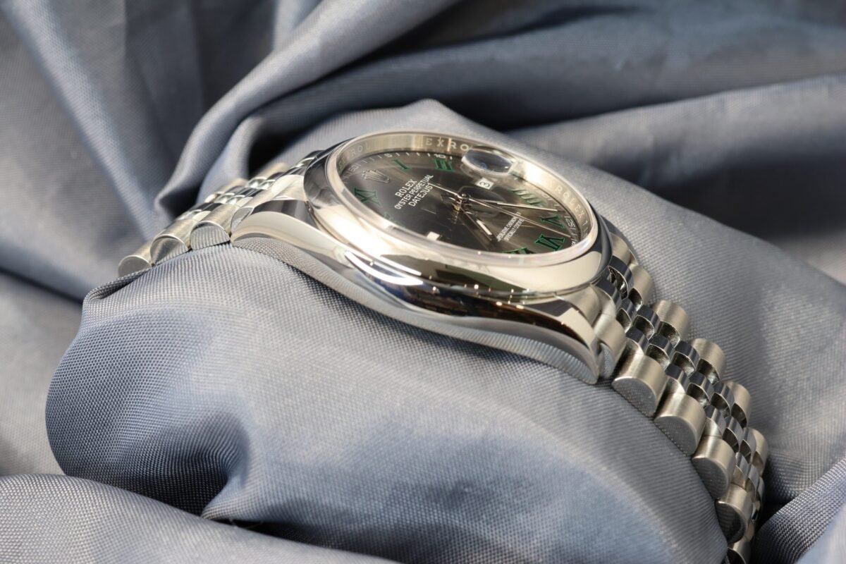 Rolex Datejust 36mm Wimbledon Dial 126200 stainless steel watch side view with smooth bezel and jubilee bracelet