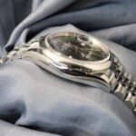 Rolex Datejust 36mm Wimbledon Dial 126200 stainless steel watch side view with smooth bezel and jubilee bracelet