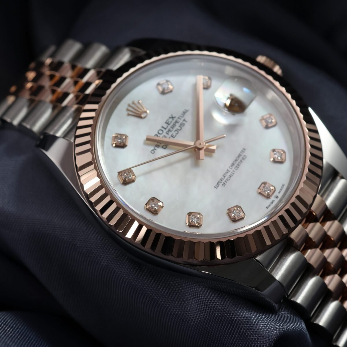 Rolex Datejust 41mm 126331 case side profile showing everose gold fluted bezel and steel case