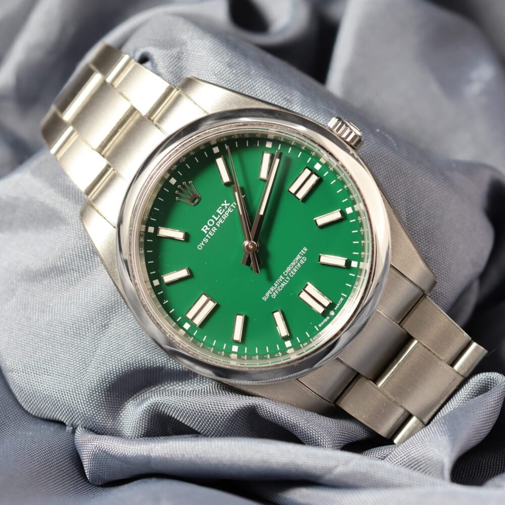Rolex Oyster Perpetual 41mm 124300 green dial stainless steel watch dial close up