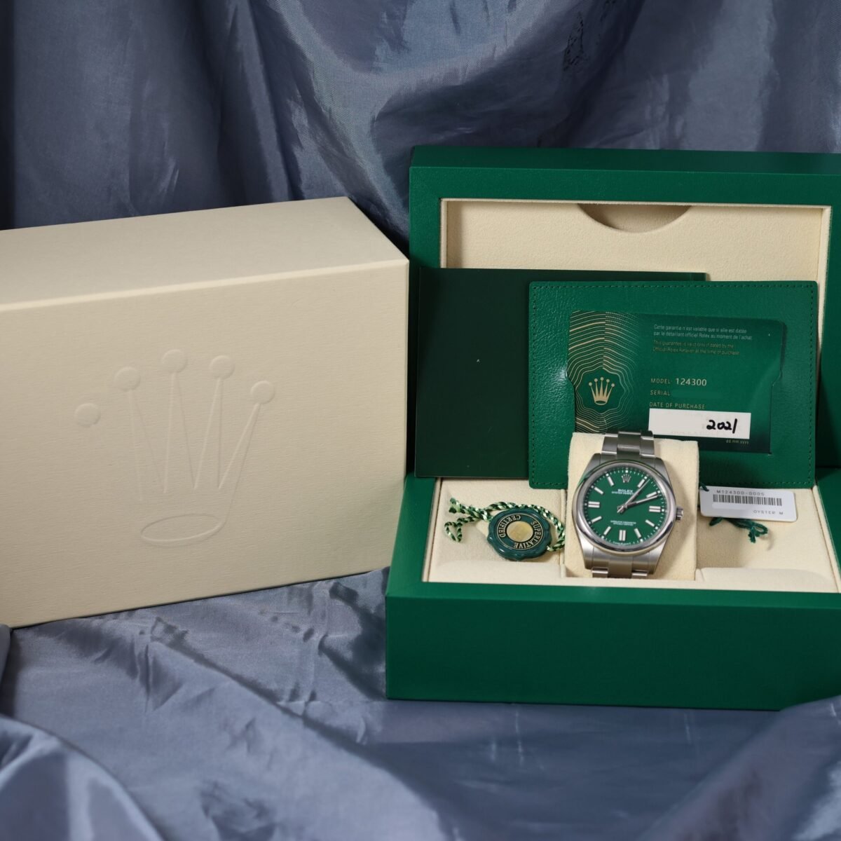 Rolex Oyster Perpetual 41mm 124300 green dial with original Rolex box and papers