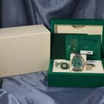 Rolex Oyster Perpetual 41mm 124300 green dial with original Rolex box and papers